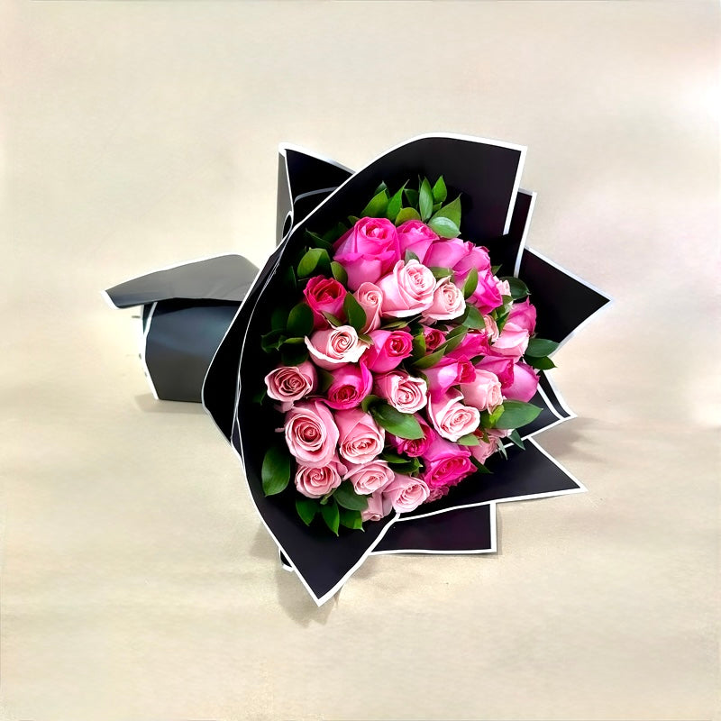 Ramo de 50 rosas fucsia y rosas