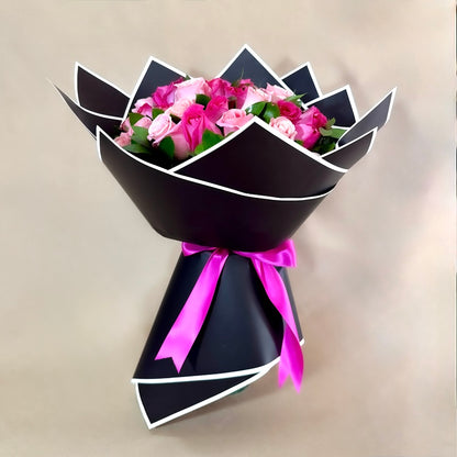 Ramo de 50 rosas fucsia y rosas