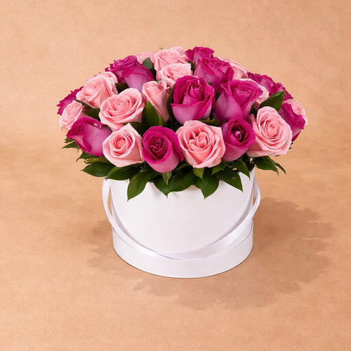 Caja 50 rosas fucsias y rosas